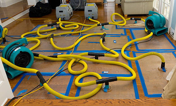 Professional Flood Damage Restoration technician working in Garner, NC